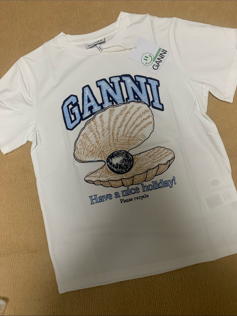 Ganni White Tee with Blue Logo and Tan Shell Graphic - Picture 2 of 5